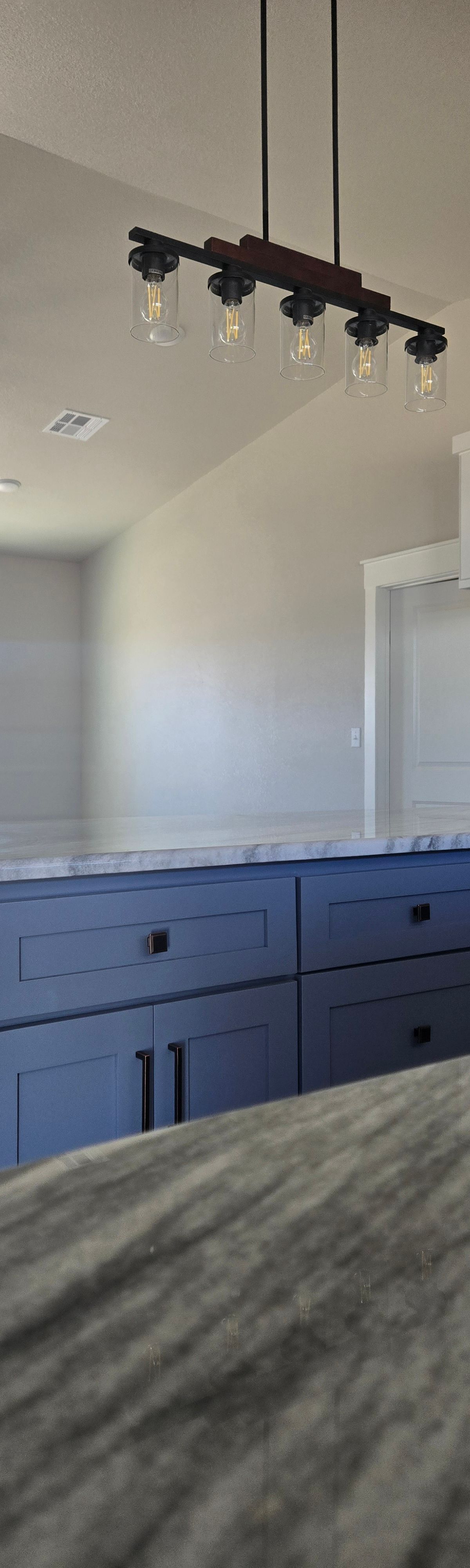 Kitchen detail with pendant lighting